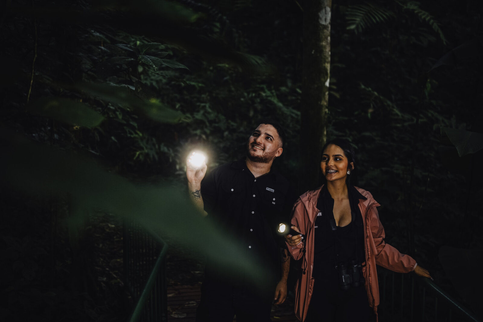 Group on a guided La Fortuna night nature walk exploring rainforest trails