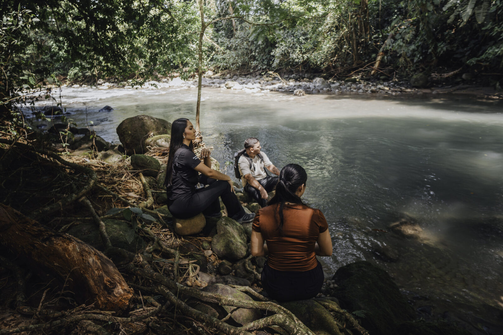 Couple walking through rainforest on an Arenal guided hiking tour